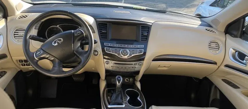 Clean tan leather SUV interior after a Fast Clean Mobile Detailing interior detail.
